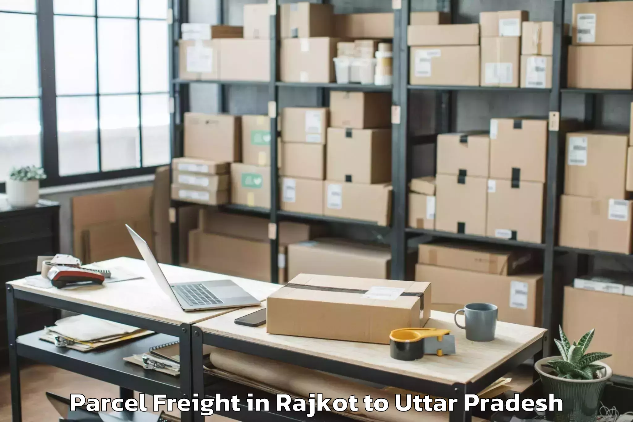 Professional Rajkot to Nichlaul Parcel Freight